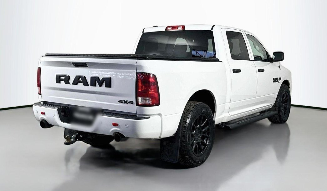 Rear tow bar and tailgate of a RAM pickup set up for towing