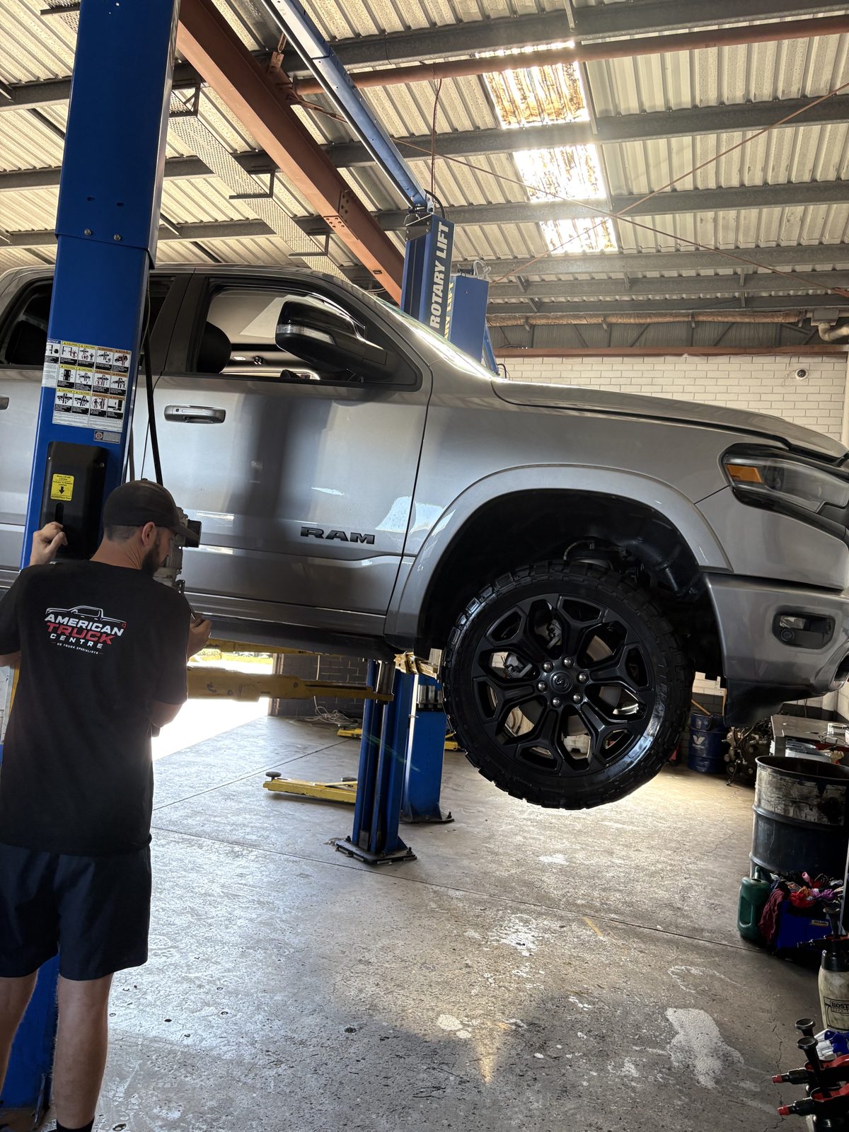 RAM 1500 raised on the hoist at American Truck Centre's Caloundra workshop